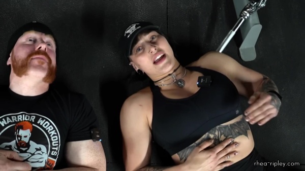 Rhea_Ripley_flexes_on_Sheamus_with_her__Nightmare__Arms_workout_5819.jpg