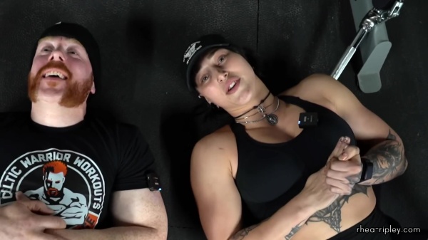 Rhea_Ripley_flexes_on_Sheamus_with_her__Nightmare__Arms_workout_5889.jpg