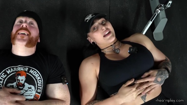 Rhea_Ripley_flexes_on_Sheamus_with_her__Nightmare__Arms_workout_5894.jpg