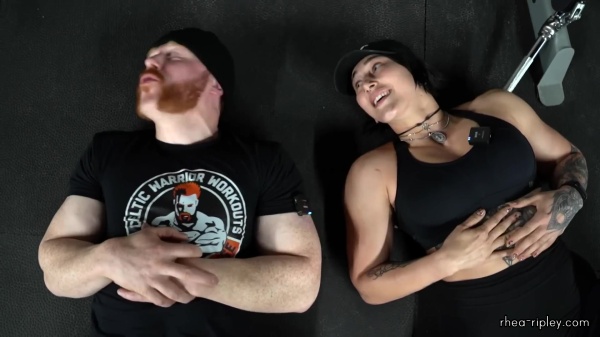 Rhea_Ripley_flexes_on_Sheamus_with_her__Nightmare__Arms_workout_5903.jpg