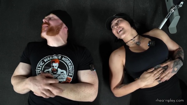 Rhea_Ripley_flexes_on_Sheamus_with_her__Nightmare__Arms_workout_5907.jpg