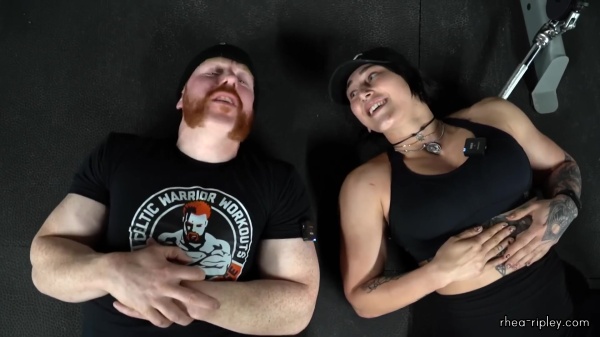 Rhea_Ripley_flexes_on_Sheamus_with_her__Nightmare__Arms_workout_5910.jpg