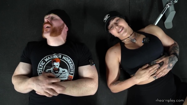 Rhea_Ripley_flexes_on_Sheamus_with_her__Nightmare__Arms_workout_5913.jpg