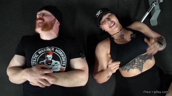 Rhea_Ripley_flexes_on_Sheamus_with_her__Nightmare__Arms_workout_5916.jpg