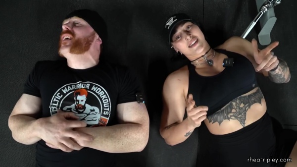 Rhea_Ripley_flexes_on_Sheamus_with_her__Nightmare__Arms_workout_5917.jpg