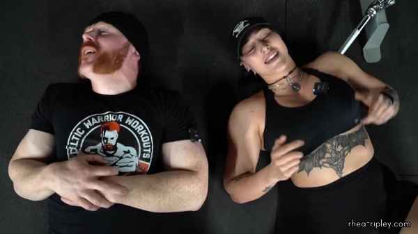 Rhea_Ripley_flexes_on_Sheamus_with_her__Nightmare__Arms_workout_5918.jpg