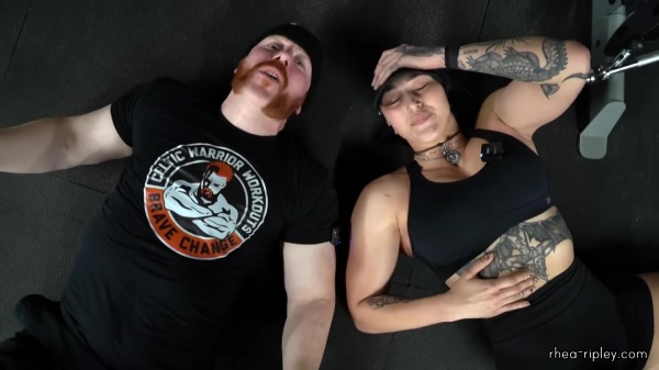 Rhea_Ripley_flexes_on_Sheamus_with_her__Nightmare__Arms_workout_5964.jpg