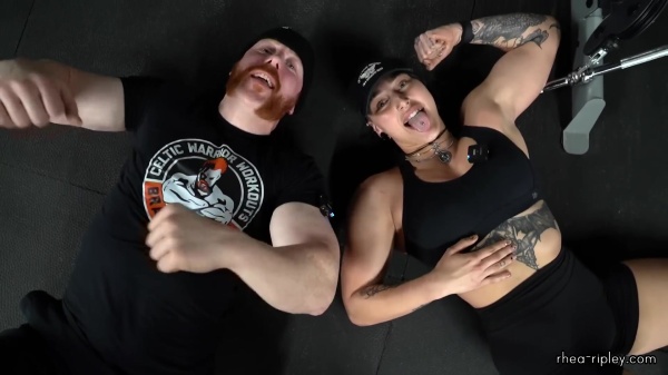 Rhea_Ripley_flexes_on_Sheamus_with_her__Nightmare__Arms_workout_5994.jpg