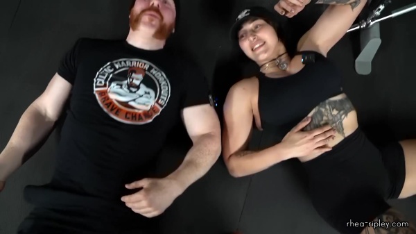 Rhea_Ripley_flexes_on_Sheamus_with_her__Nightmare__Arms_workout_6032.jpg