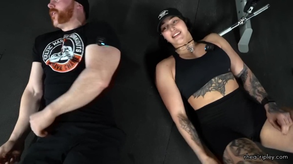 Rhea_Ripley_flexes_on_Sheamus_with_her__Nightmare__Arms_workout_6034.jpg