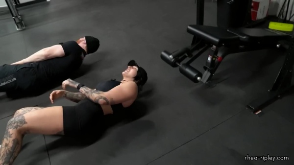 Rhea_Ripley_flexes_on_Sheamus_with_her__Nightmare__Arms_workout_6046.jpg