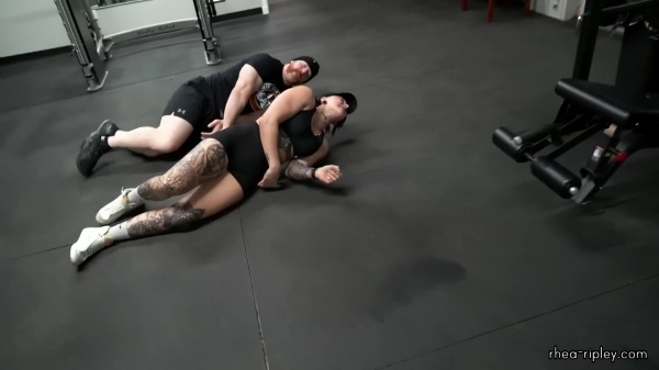 Rhea_Ripley_flexes_on_Sheamus_with_her__Nightmare__Arms_workout_6053.jpg