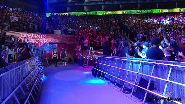 WWE_Money_In_The_Bank_2023_Rhea_Ringside_Attacks_Cody_0565.jpg
