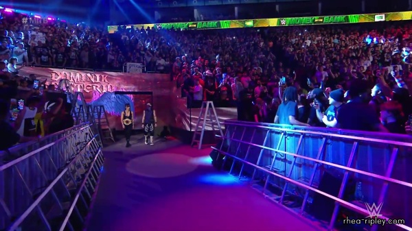 WWE_Money_In_The_Bank_2023_Rhea_Ringside_Attacks_Cody_0566.jpg
