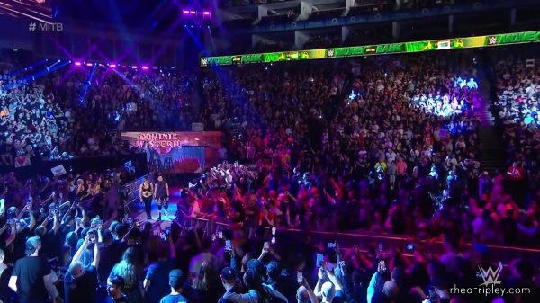 WWE_Money_In_The_Bank_2023_Rhea_Ringside_Attacks_Cody_0629.jpg