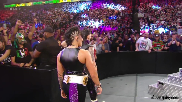 WWE_Money_In_The_Bank_2023_Rhea_Ringside_Attacks_Cody_0733.jpg