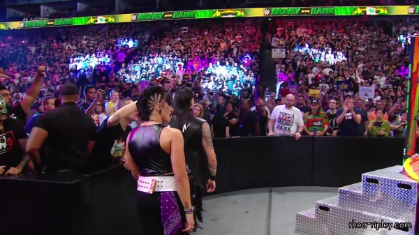 WWE_Money_In_The_Bank_2023_Rhea_Ringside_Attacks_Cody_0735.jpg