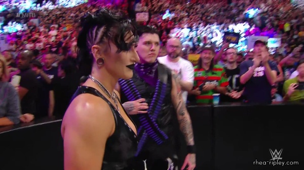 WWE_Money_In_The_Bank_2023_Rhea_Ringside_Attacks_Cody_0753.jpg