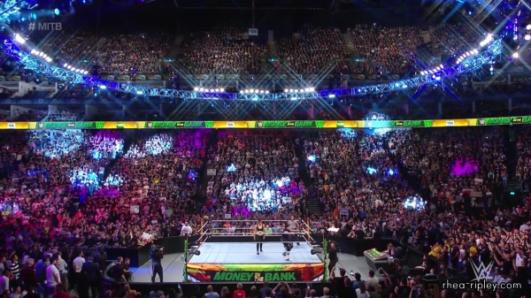 WWE_Money_In_The_Bank_2023_Rhea_Ringside_Attacks_Cody_0806.jpg