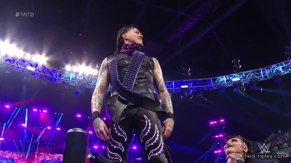 WWE_Money_In_The_Bank_2023_Rhea_Ringside_Attacks_Cody_0818.jpg