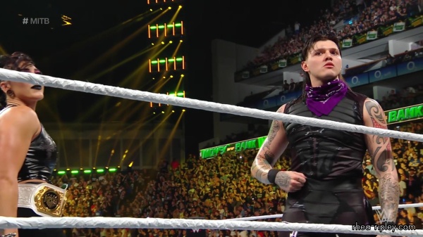 WWE_Money_In_The_Bank_2023_Rhea_Ringside_Attacks_Cody_0856.jpg