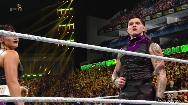WWE_Money_In_The_Bank_2023_Rhea_Ringside_Attacks_Cody_0857.jpg
