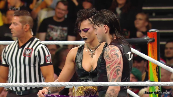 WWE_Money_In_The_Bank_2023_Rhea_Ringside_Attacks_Cody_0881.jpg