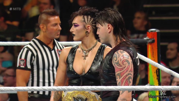 WWE_Money_In_The_Bank_2023_Rhea_Ringside_Attacks_Cody_0886.jpg
