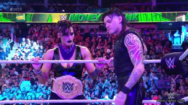 WWE_Money_In_The_Bank_2023_Rhea_Ringside_Attacks_Cody_0897.jpg