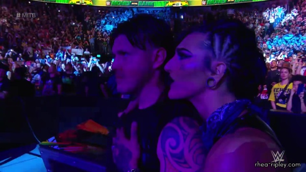 WWE_Money_In_The_Bank_2023_Rhea_Ringside_Attacks_Cody_0908.jpg