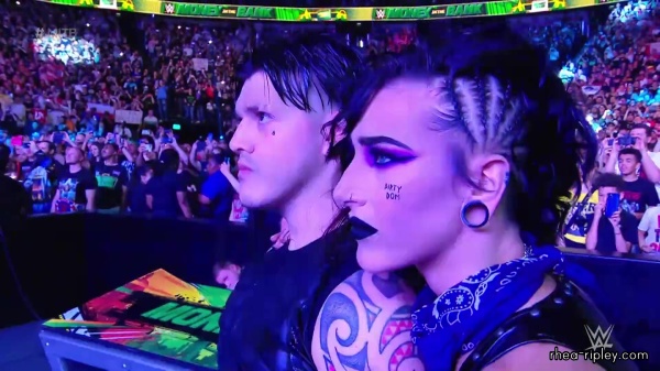 WWE_Money_In_The_Bank_2023_Rhea_Ringside_Attacks_Cody_0914.jpg
