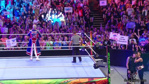 WWE_Money_In_The_Bank_2023_Rhea_Ringside_Attacks_Cody_1043.jpg