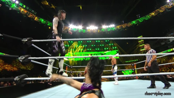 WWE_Money_In_The_Bank_2023_Rhea_Ringside_Attacks_Cody_1112.jpg
