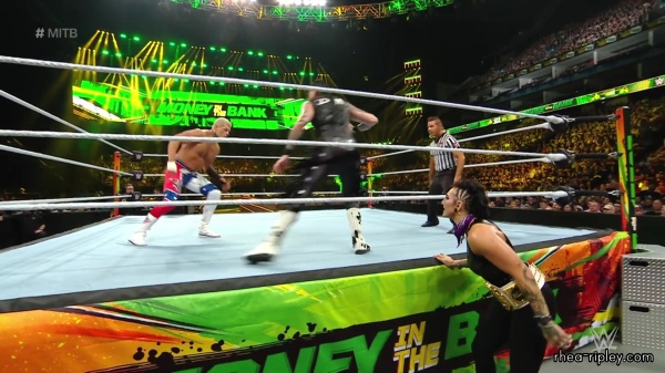 WWE_Money_In_The_Bank_2023_Rhea_Ringside_Attacks_Cody_1122.jpg