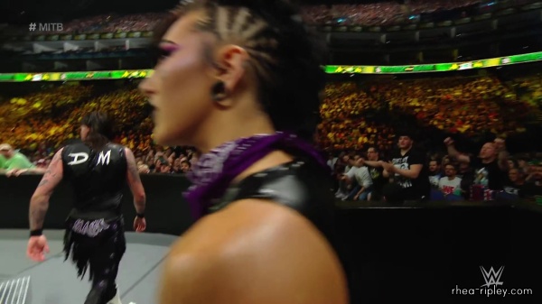 WWE_Money_In_The_Bank_2023_Rhea_Ringside_Attacks_Cody_1167.jpg