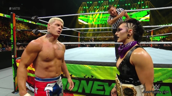 WWE_Money_In_The_Bank_2023_Rhea_Ringside_Attacks_Cody_1275.jpg