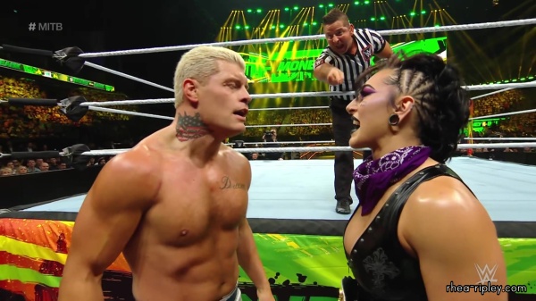 WWE_Money_In_The_Bank_2023_Rhea_Ringside_Attacks_Cody_1281.jpg