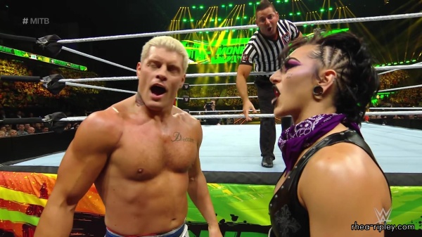 WWE_Money_In_The_Bank_2023_Rhea_Ringside_Attacks_Cody_1282.jpg