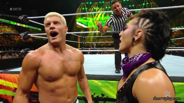 WWE_Money_In_The_Bank_2023_Rhea_Ringside_Attacks_Cody_1283.jpg