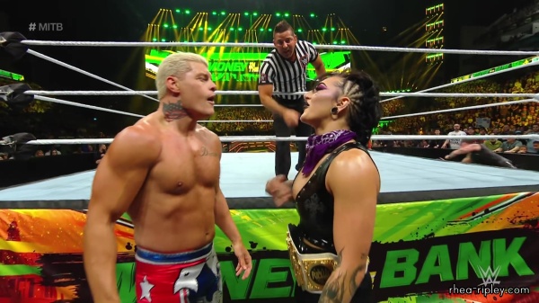 WWE_Money_In_The_Bank_2023_Rhea_Ringside_Attacks_Cody_1289.jpg