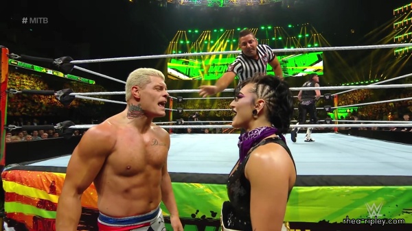 WWE_Money_In_The_Bank_2023_Rhea_Ringside_Attacks_Cody_1296.jpg