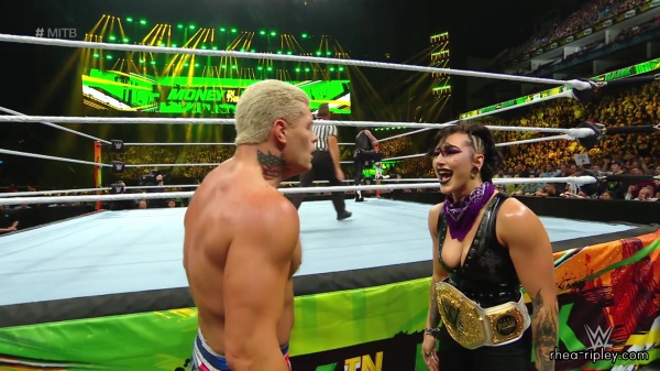 WWE_Money_In_The_Bank_2023_Rhea_Ringside_Attacks_Cody_1317.jpg