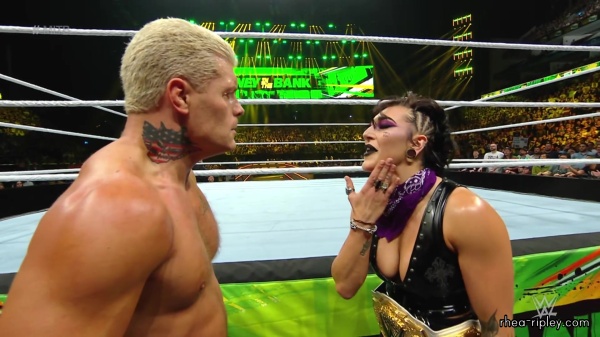 WWE_Money_In_The_Bank_2023_Rhea_Ringside_Attacks_Cody_1322.jpg