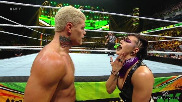 WWE_Money_In_The_Bank_2023_Rhea_Ringside_Attacks_Cody_1324.jpg