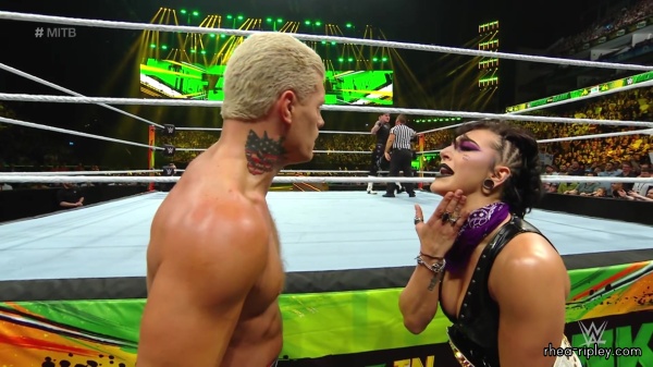 WWE_Money_In_The_Bank_2023_Rhea_Ringside_Attacks_Cody_1325.jpg