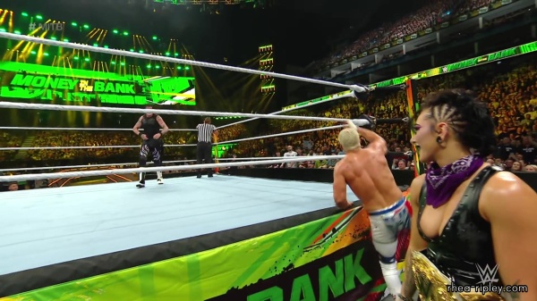 WWE_Money_In_The_Bank_2023_Rhea_Ringside_Attacks_Cody_1333.jpg