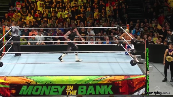 WWE_Money_In_The_Bank_2023_Rhea_Ringside_Attacks_Cody_1336.jpg