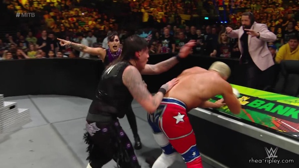 WWE_Money_In_The_Bank_2023_Rhea_Ringside_Attacks_Cody_1368.jpg