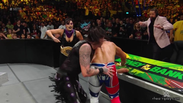 WWE_Money_In_The_Bank_2023_Rhea_Ringside_Attacks_Cody_1369.jpg