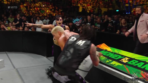 WWE_Money_In_The_Bank_2023_Rhea_Ringside_Attacks_Cody_1370.jpg